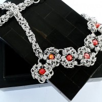 Asymmetric Romanov necklace